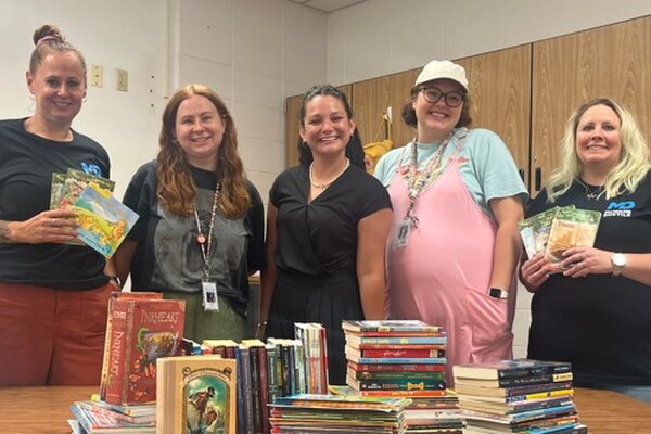 McWane Ductile - Utah donates books to local elementary school