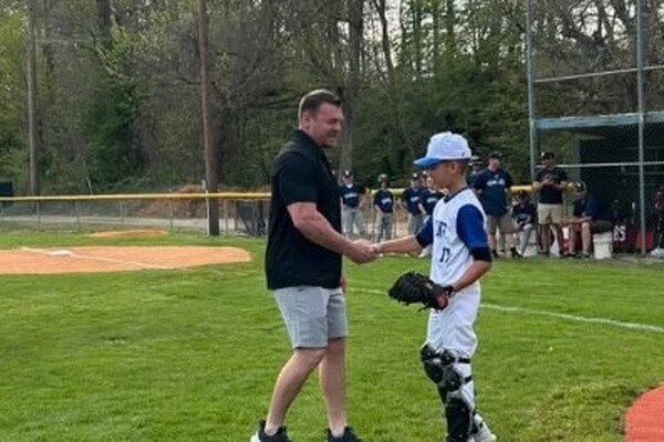 Building community through youth sports sponsorship