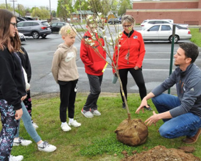 McWane Poles Assistant Environmental Manager is impacting the Coshocton community one tree planting at a time